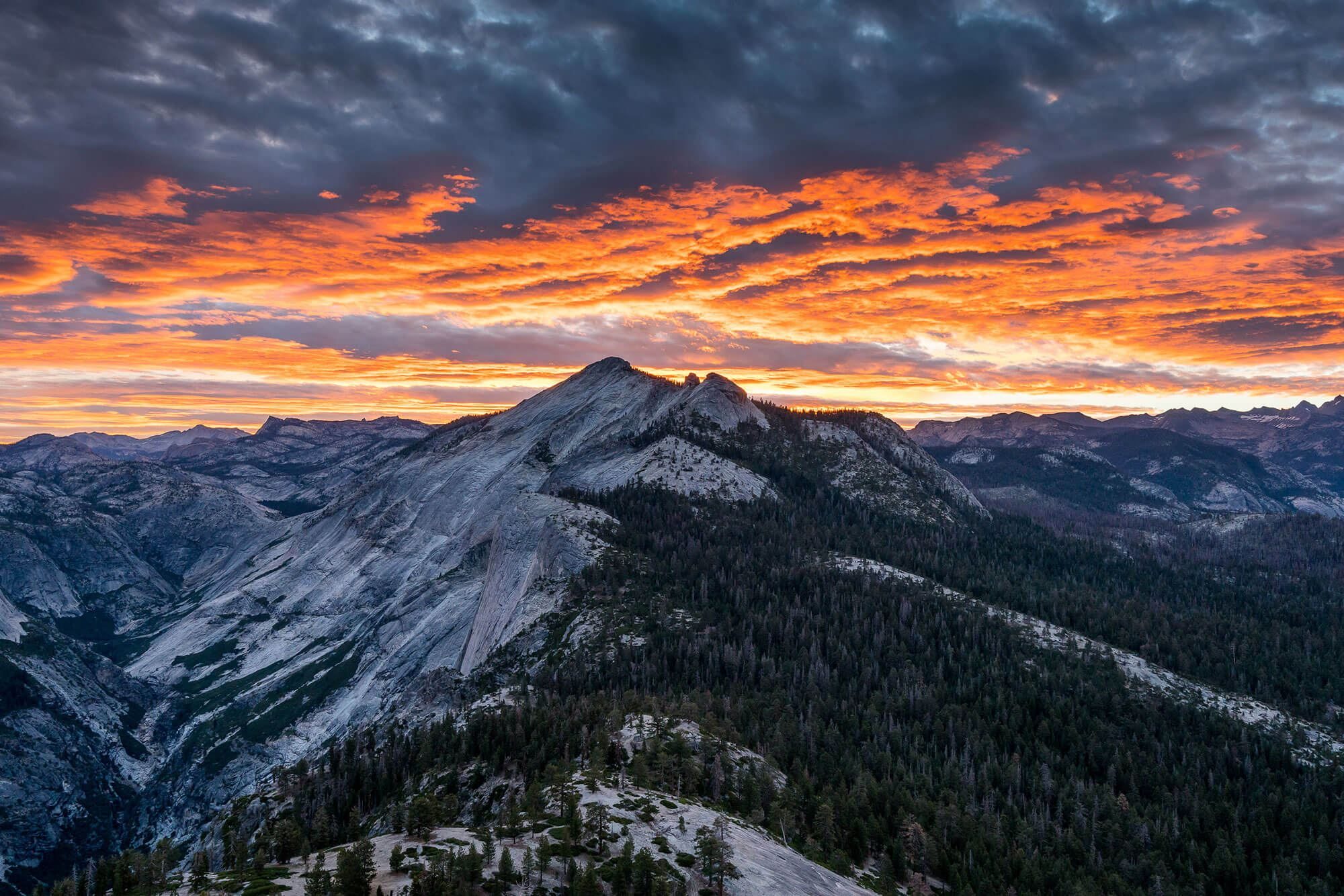 sunrise over clouds rest from half dome at yosemite national park | photo by jake landon schwartz