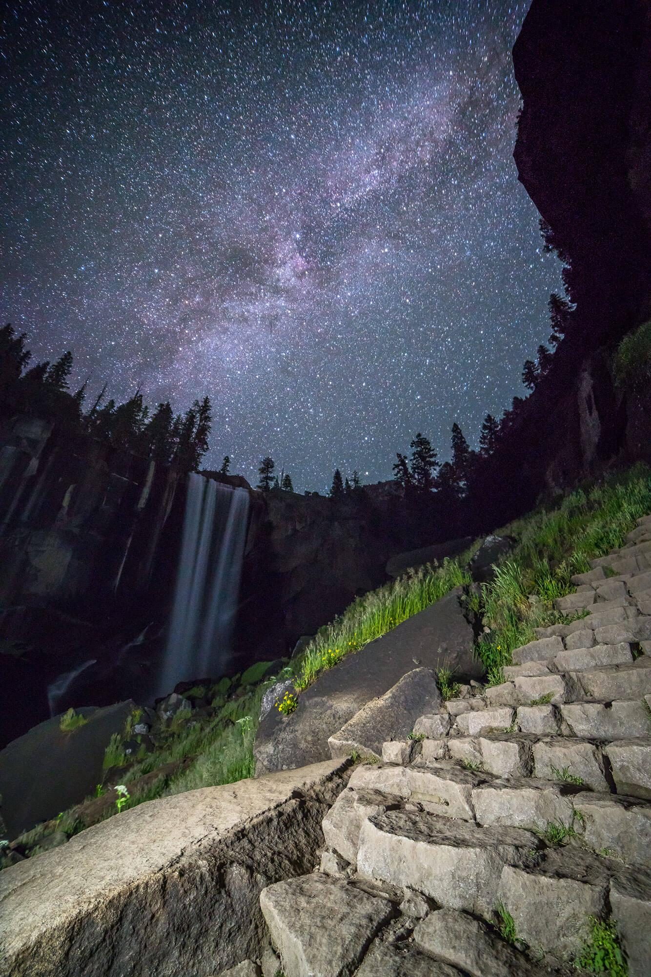 long exposure of the milky way above vernal falls on the mist trail in yosemite national park | photo by jake landon schwartz