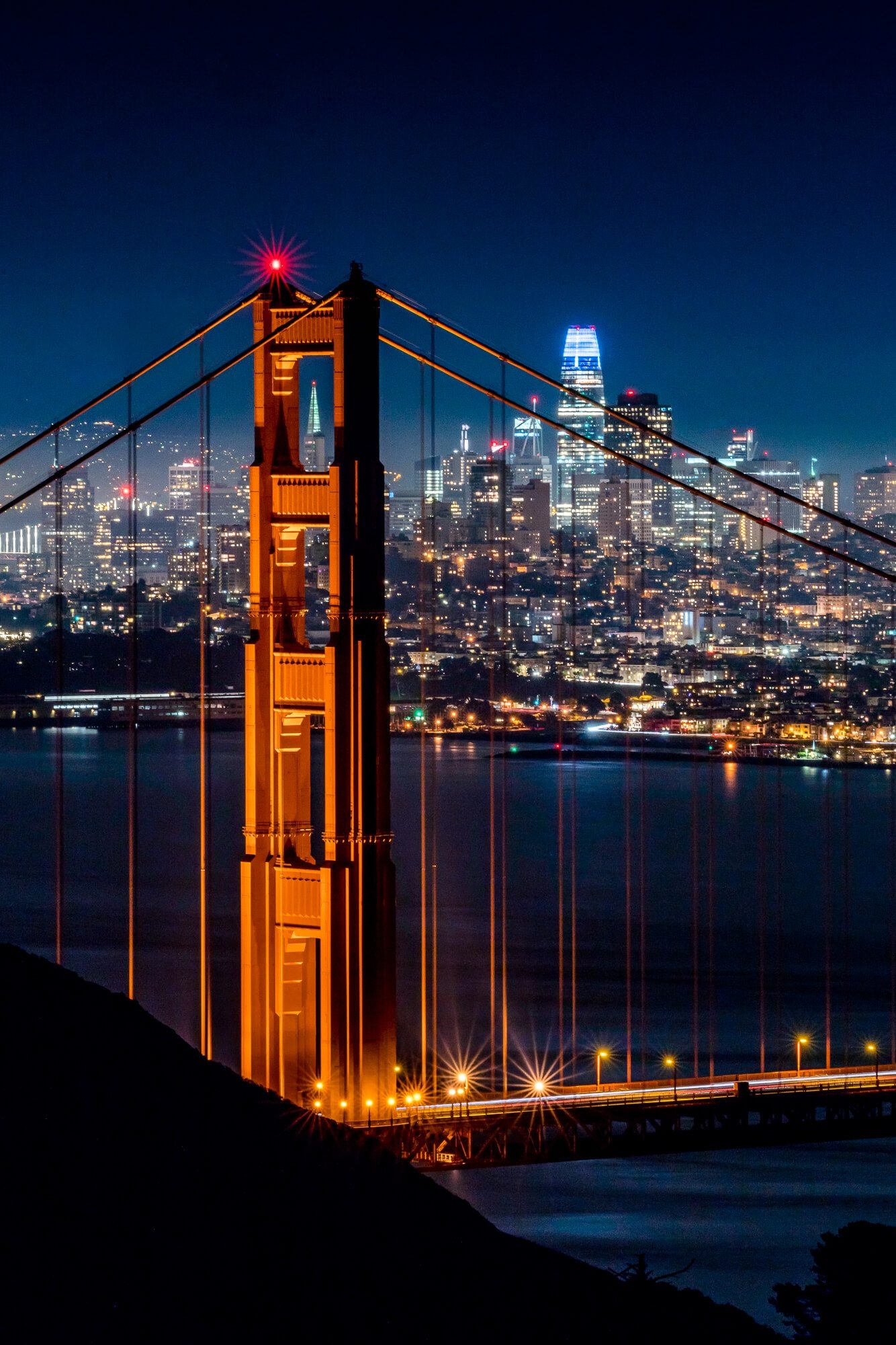 the transamerica pyramid lined up with the north tower of the golden gate bridge in san francisco | photo by jake landon schwartz