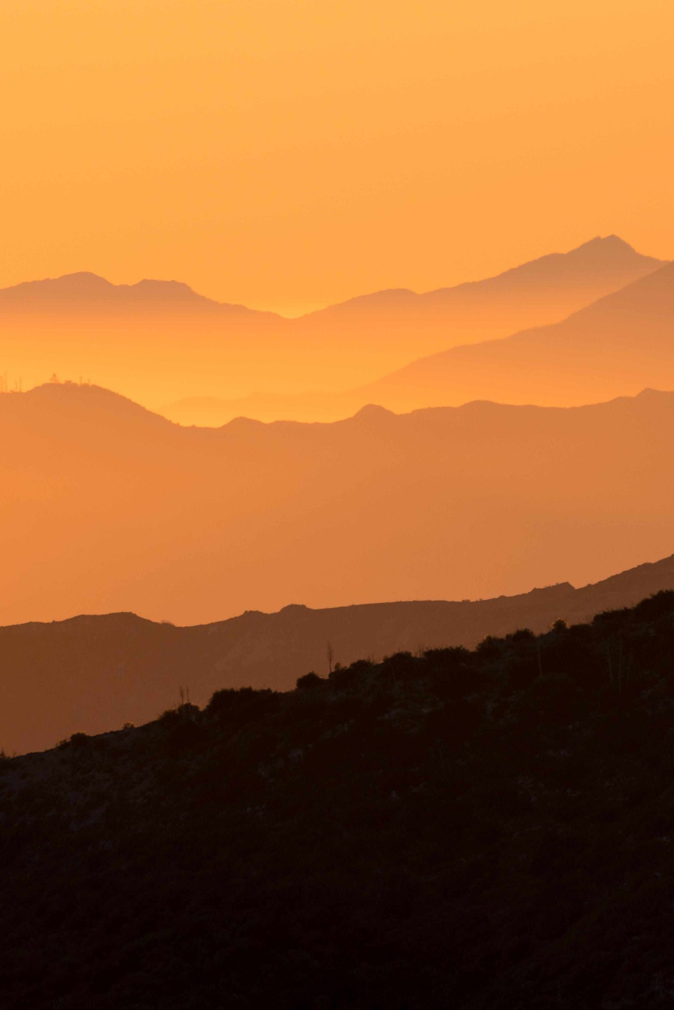 layers of mountains in the santa monica mountain range during sunset from mt wilson | photo by jake landon schwartz