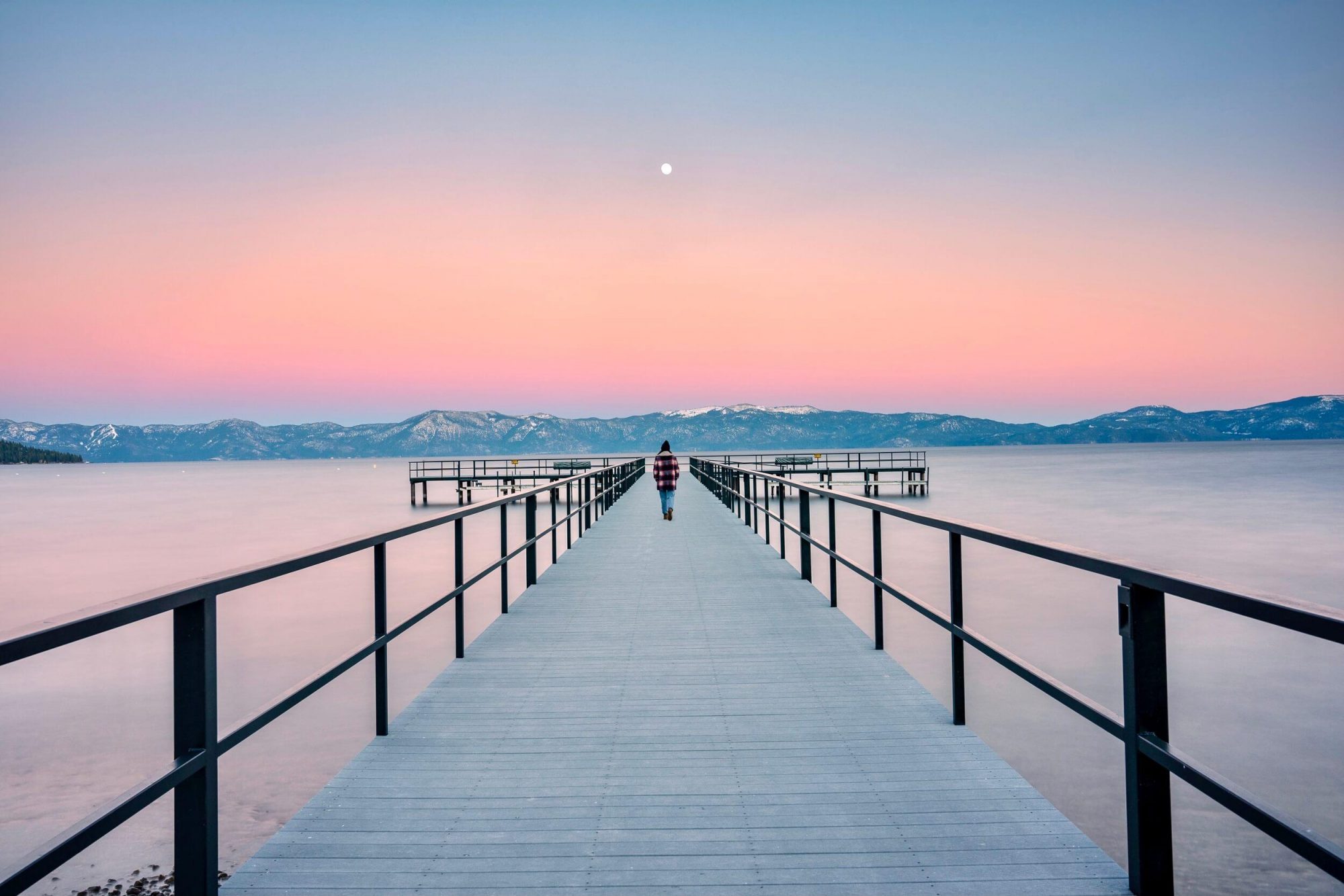 Carly Wallace walking on a pier in Tahoe City, California by Jake Landon Schwartz | photo by jake landon schwartz